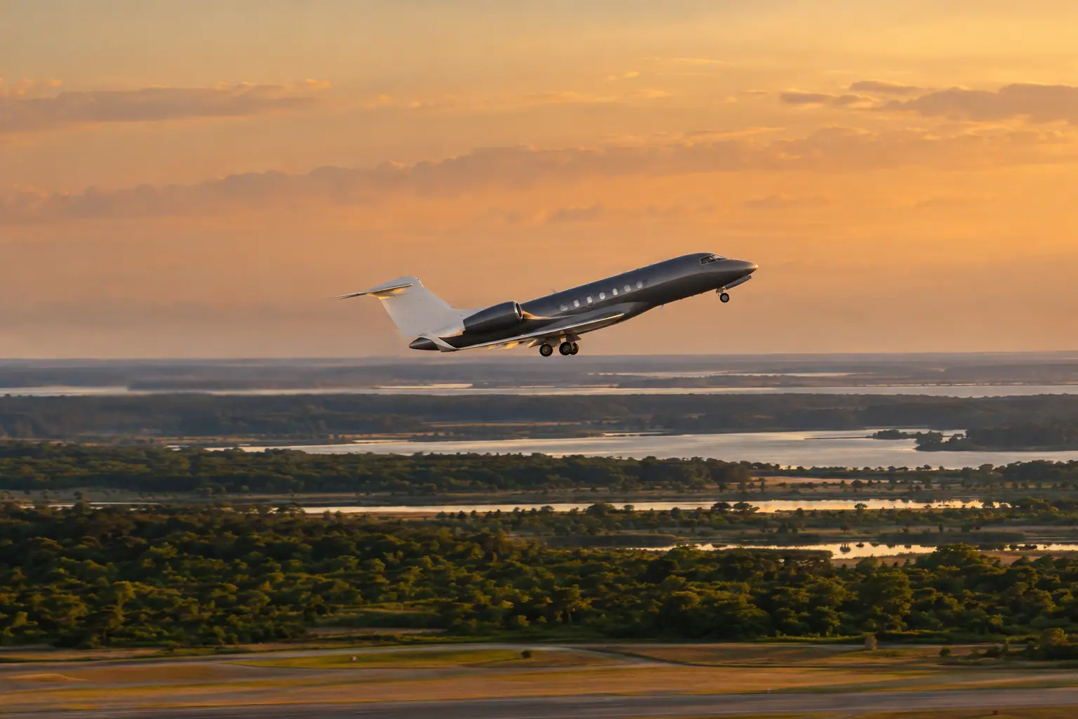 Private jet climbing out over the US